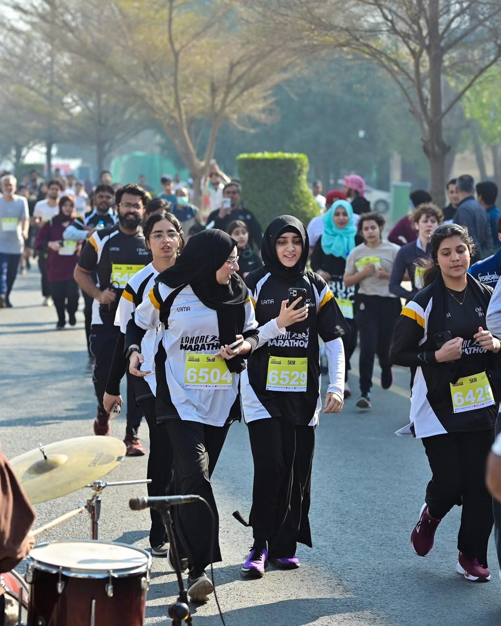 A group of women in hijabs running the 5K